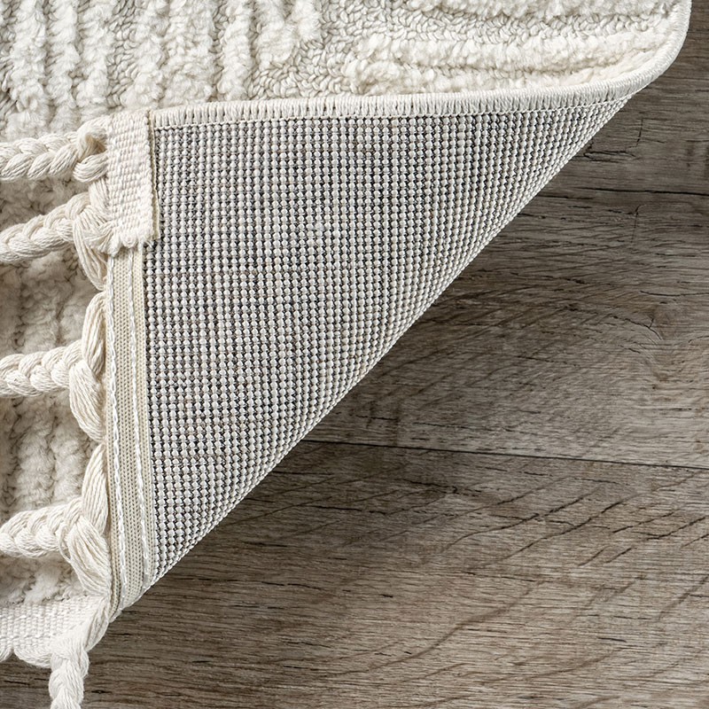 Kerry Textured Geometric Tasseled Area Rug