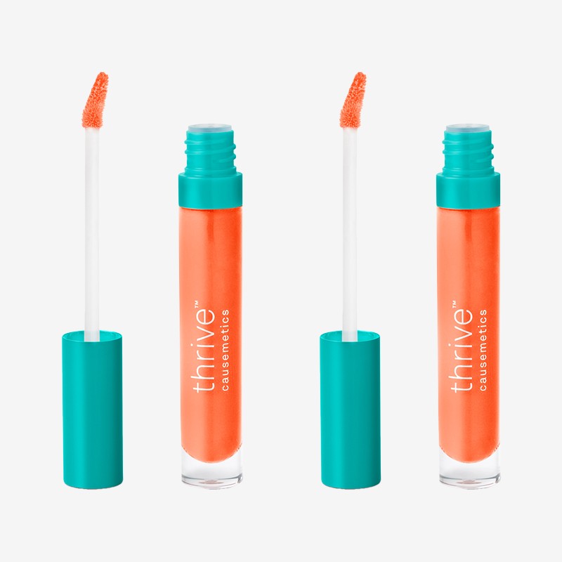 Thrive Causemetics® Sheer Strength™ Lip-Plumping Peptide Gloss in Taylor (True Tangerine)