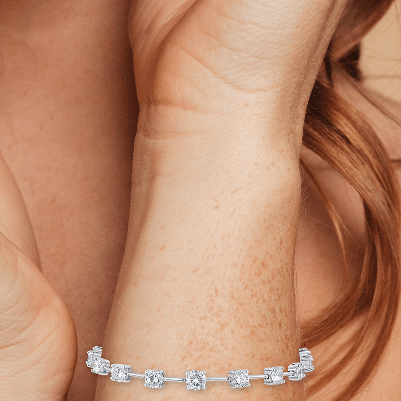 7Cttw Graduated Round Cz Bar Spaced Bracelet