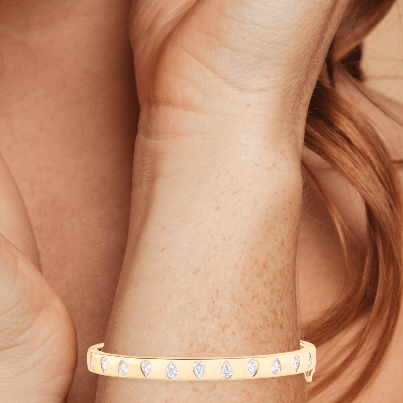 2.5 Cttw Up Down Pear Cz Inset Hinged Bangle